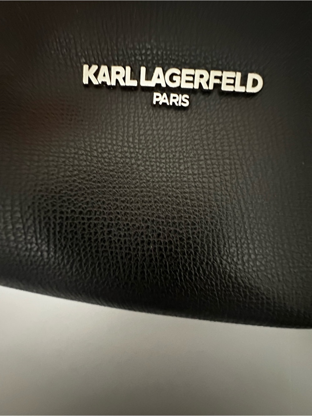 Karl Lagerfeld Paris Black Pebbled Barrel Crossbody Bag with Logo Guitar Strap - Picture 9 of 13